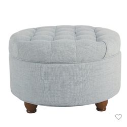 Round tufted ottoman with storage 