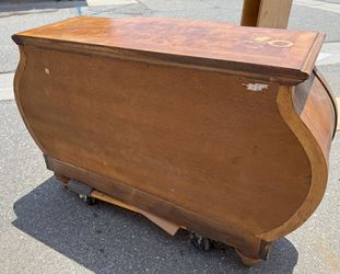 Indonesian style entryway console with burl-wood finish