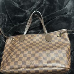 Louis Vuitton Neverfull PM tote bag in the Damier Ebene coated canvas