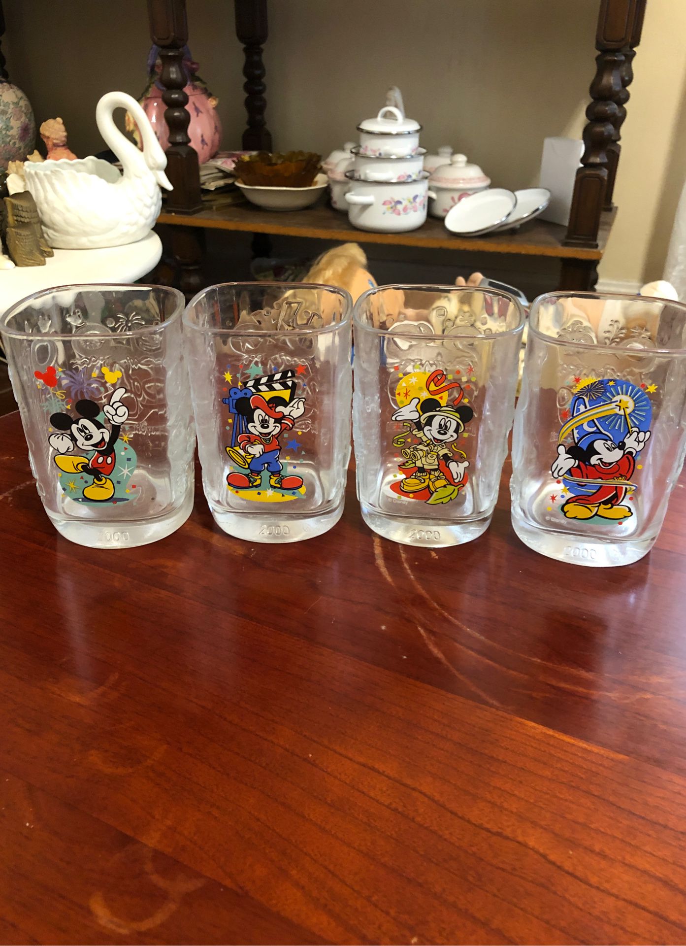 Walt Disney set of 4 2000 millinium celebration glasses McDonald’s