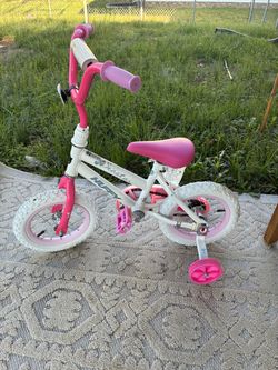 *WILL TRADE* pink Huffy Sea Star 12-inch kids' bike with training wheels