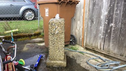 Concrete fountain 32 inches tall about 10 inches square  needs pump they sell on Amazon for like 20 to 30 dollars or hook to water hose  50.00