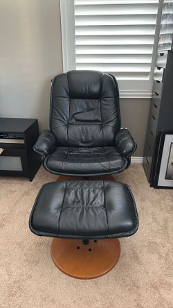 Black lounge chair with ottoman