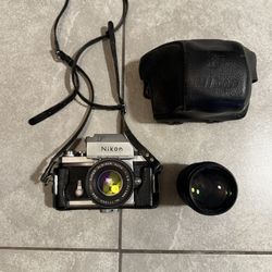 Nikon F With Two Lenses 