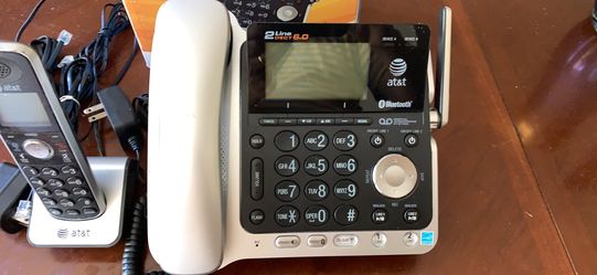 AT & T 2-line corded/cordless answering system with Bluetooth, base speakerphone DECT 6.0 Digital
