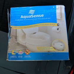 Raised Toilet Seat With Lid