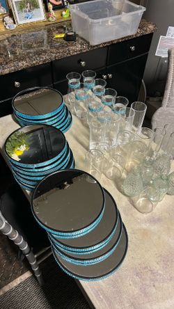 Small glass vases and mirrors