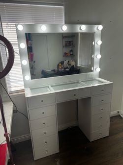 Makeup vanity with mirror