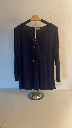 Woman’s navy blue long sleeve Top