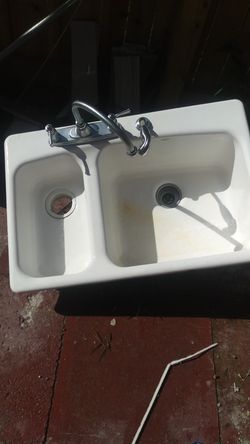 Iron and porcelain sink