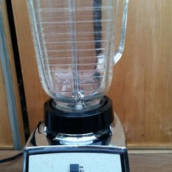 Osterizer Galaxie IV 4 speed Vintage Blender in rare chrome and blue front color.