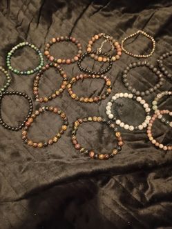 Men's Bracelets Assorted Precious Gem Especially Arissa's favorite word for Everyone that loves her me included  Especially the 3 assorted Tiger Eyes