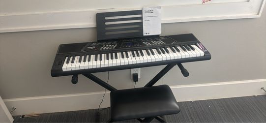 Digital piano with stand and bench