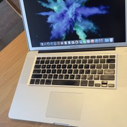 Apple MacBook Pro 15” Screen Intel Core I7 Processor 4GB RAM 256GB SSD Storage $145