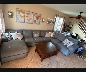 Beautiful large grey sectional couch from Jerome's