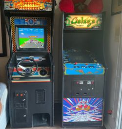 Pole Position arcade and Galaga arcade game cabinet