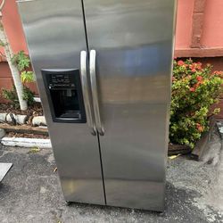 GE Stainless Steel Refrigerator; Side by Side  