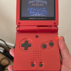 Red Nintendo Gameboy Advance SP - comes with charger and game