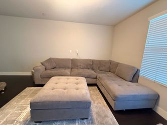 Free grey sectional with ottoman