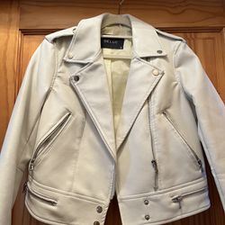 Cool leather jacket. Deluc Jacket. Off white. Size xs Never been worn, no tags. Lots of cool details. Zippers  Pockets. Studded. Stylish color in the 