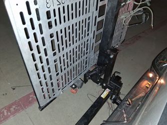 Hitch-Mounted Motorized Wheelchair Carrier Lift