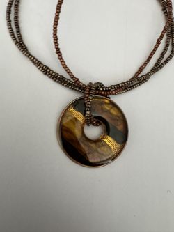 Beaded Necklace with Circular Pendant