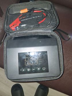 Air pump and jumper cables and a code reader