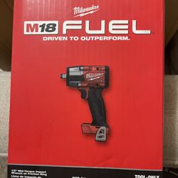 Milwaukee Mid Torque Impact Drill and 2 6AH Batteries