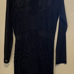 Woman’s Black Dress