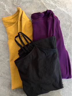 3 medium size women’s shirts