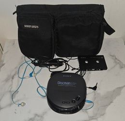 Vintage Sony Discman ESP portable compact disc player bundle.
