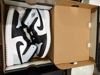 Kids 13.5 brand new Nikes . Never worn , a size too small