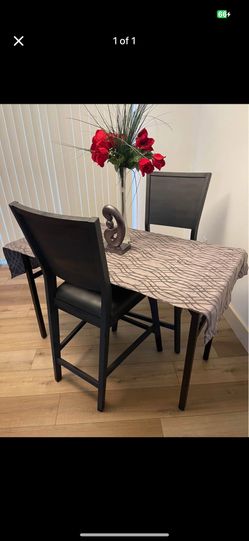 TABLE AND 2 HIGH CHAIRS