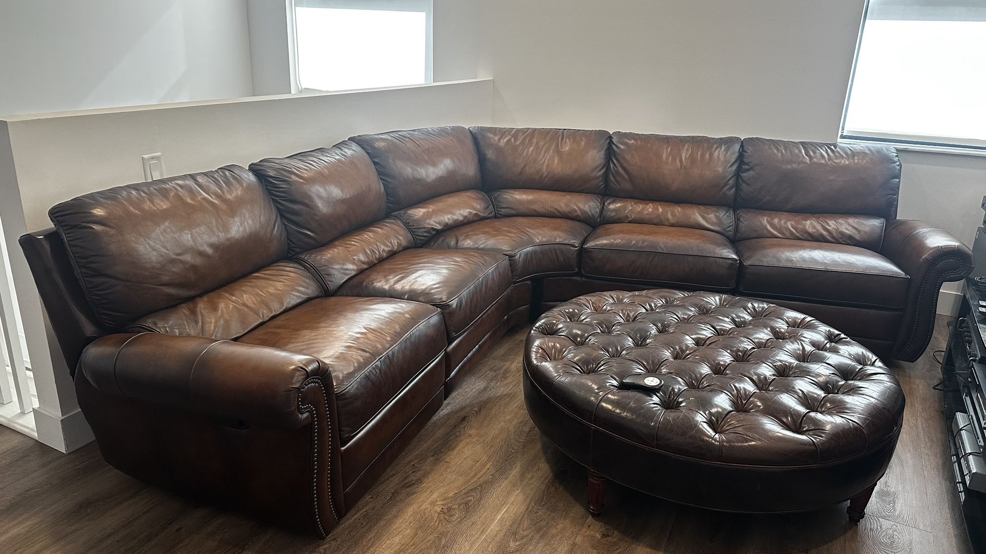 Reclinable Leather sectional w/ Ottoman
