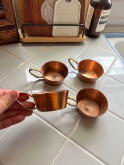 Vintage set of copper and brass cups
