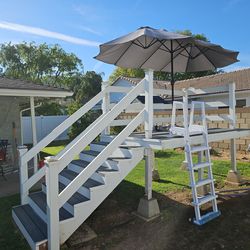 Above ground custom pool deck. One season old .