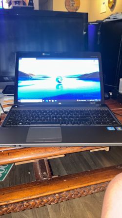 HP Windows10 Pro with 500 gigs data , Camera, WiFi , Charger Battery Good 4gigs RAM