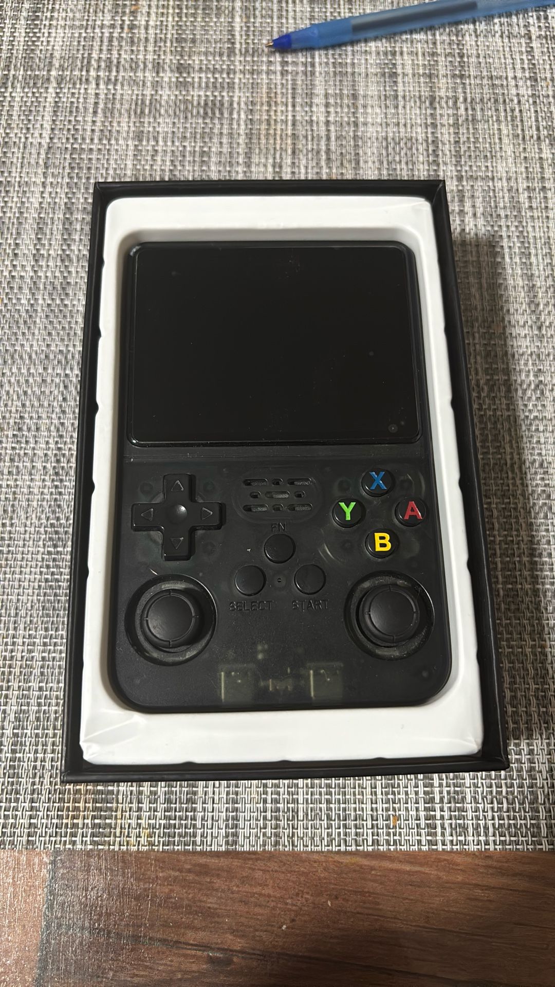 R36S portable retro console with 1000+ games from different consoles