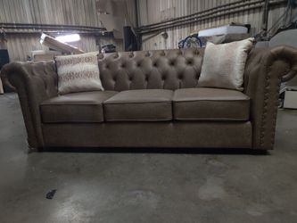 Tufted sofa and loveseat camel color with bronze nail heads