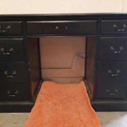 Desk, MK purse, Black leather chair