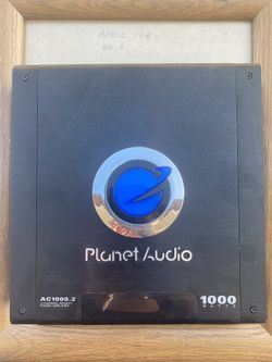 Black and blue Vehicle Planet Audio 1000 Watts AMP Be