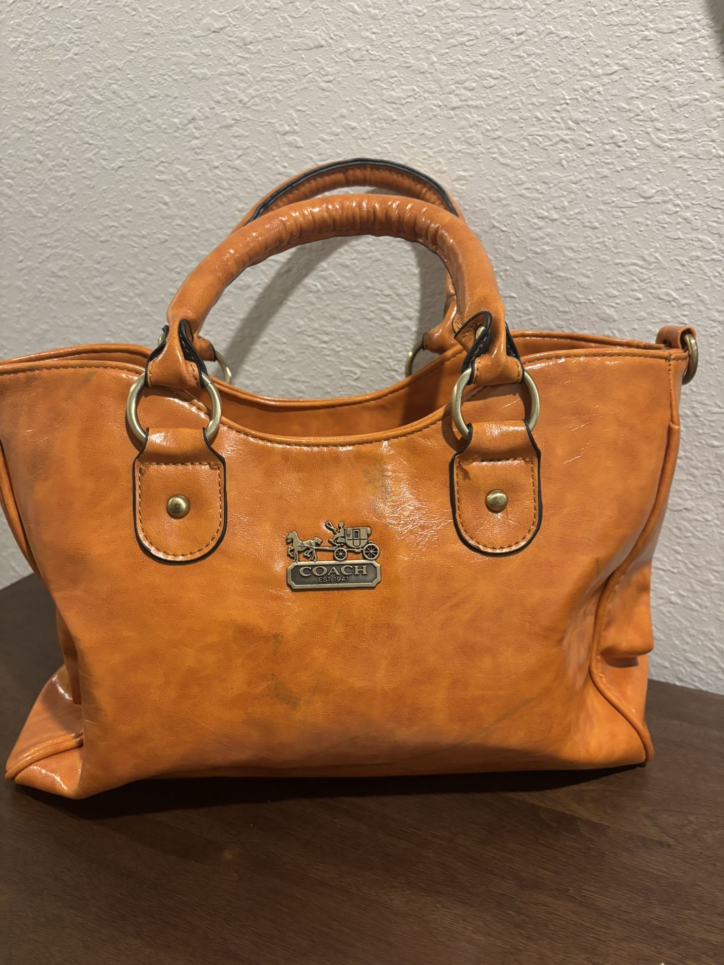 Orange or Gold Coach Handbag