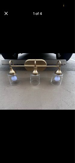 Three light brass vanity light