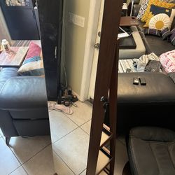 Swivel jewelry mirror storage with shelves
