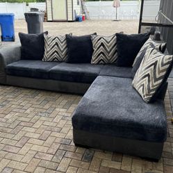 Novelia 2-Piece Sectional: 119"W x 91"D x 38"H. I can deliver for an additional costs