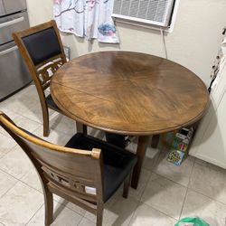 Round Walnut Table w/ chairs