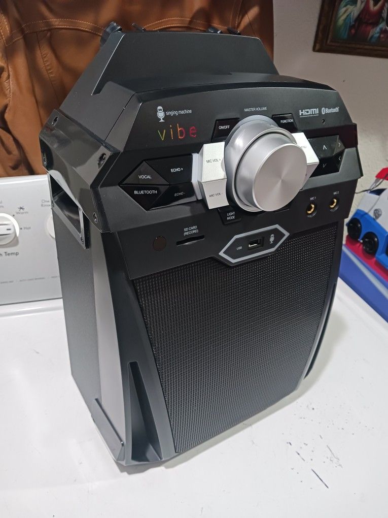 New Karaoke Vibe Singing Machine.   usb.  Bluetooth.   and 2 microphones...