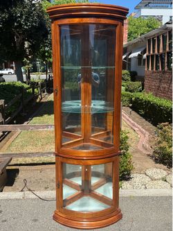 Beautiful corner curio cabinet