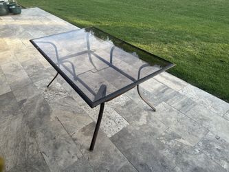 Outdoor Patio Table – Glass Top w/ Umbrella Hole (Seats 4–6)