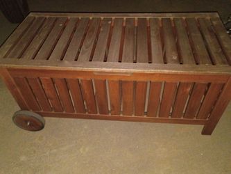 Nice rolling wood outdoor storage box with handel
